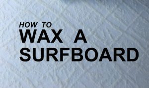 How to Wax a Surfboard Blog Feature image with text